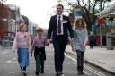 Chris Rimmer with his children from left, Scarlett, 10, Toby, 6, and Imogen, 12, after the service. Mr Rimmer served in Iraq and Afghanistan as part of the Royal Tank Regiment. City of Southampton Remembrance Day Service at the Cenotaph, Watts Park,
