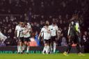 Fulham’s Joao Palhinha celebrates scoring their side's second goal of the game with team-mates during the Premier League match at Craven Cottage, London. Picture date: Saturday December 31, 2022.