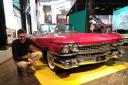 Ben Swann, head of learning at the National Motor Museum, with a 1959 Cadillac at the Motopia? exhibition