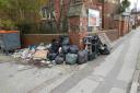 Bin bags dumped on an alleyway in Shirley Road