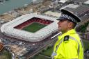 St Mary's Stadium with inset of police officer