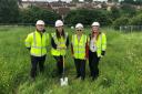 (L-R) Neil Fishlock, council architecture and construction management, councillor Stanka Adamcova, councillor Ray Ballman, and Sally Nelson, the council's housing strategy and development officer, at the site where the bungalows will be built