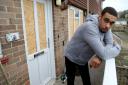 Julian Kerr at his home in Pennington which was attacked by a racist man who smashed the windows and left a note saying 
