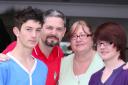 TRANSFERRED: Peter and Marie Slade with their sons Liam, left, and Jack who have been taken out of the Oasis Academy.
