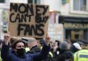 Chelsea fans protest against Chelsea's decision to be included amongst the clubs attempting to form a new European Super League before the English Premier League soccer match between Chelsea and Brighton and Hove Albion outside Stamford Bridge