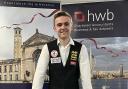 Budding international snooker star Steven Hughes, an Audit & Accounts Senior at HWB Chartered Accountants, is pictured at the pool table in the firm’s office in Chandler’s Ford