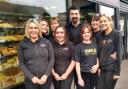 Wayne and Joanne FitzGerald with some of the 16 staff at Tilley's Bakery in Hythe