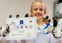 Totton child, 7, wins Bulgarian taekwondo tournament during first trip abroad