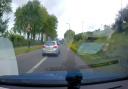 Dashcam footage shows vehicles illegally overtaking SUV by speeding in bus lane