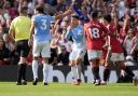 Phil Foden reacts after being shown a red card (Peter Byrne/PA)