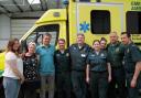 Andy Puntis, with his wife Collette and daughter Molly, meets the medical team who helped save his life after he collapsed while cycling.