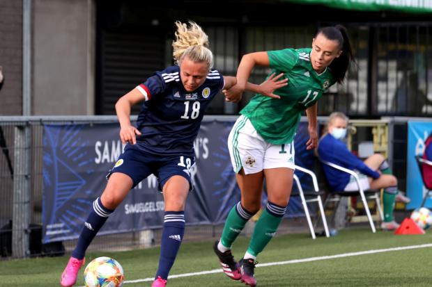 Scotland's Claire Emslie (left) and Northern Ireland's Laura Rafferty battle for the ball during the International Friendly match at Seaview Stadium, Belfast. Picture date: Thursday June 10, 2021..
