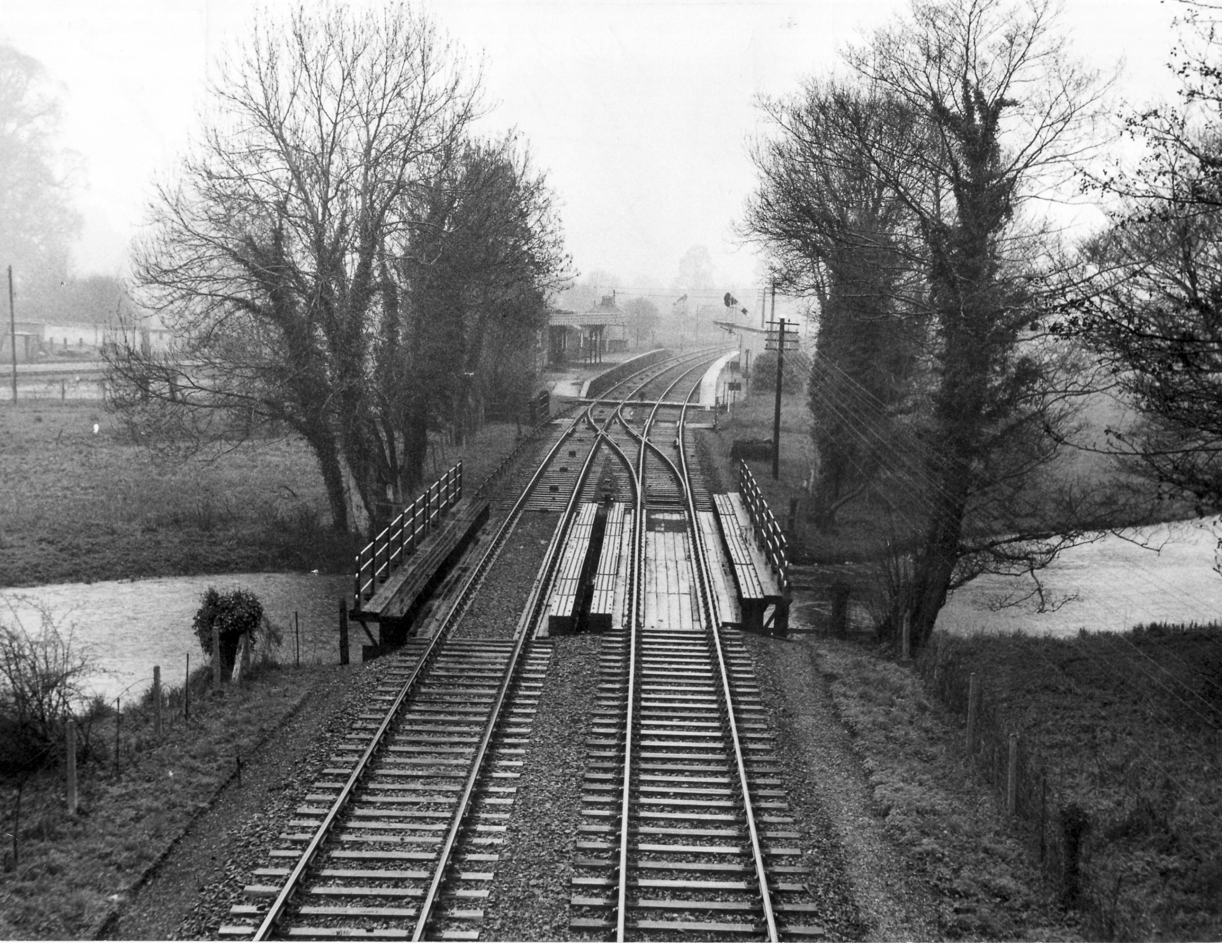 The approach to Horsebridge Station on the Sprat and Winkle Line which ran between Andover and Redbridge in Hampshire, UK. It was also known as the Andover to Redbridge Line. Copyright Wardell. Southern Daily Echo Archives.