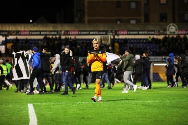 Daily Echo: Eastleigh's Sam Smart walks off the pitch at full time (Pic: Matthew Temple)