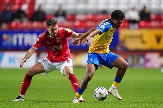 Charlton Athletic's Ben Purrington (left) and Southampton's Caleb Watts battle for the ball during the Papa John's Trophy, Southern Group G match at The Valley, London. Picture date: Tuesday October 5, 2021..