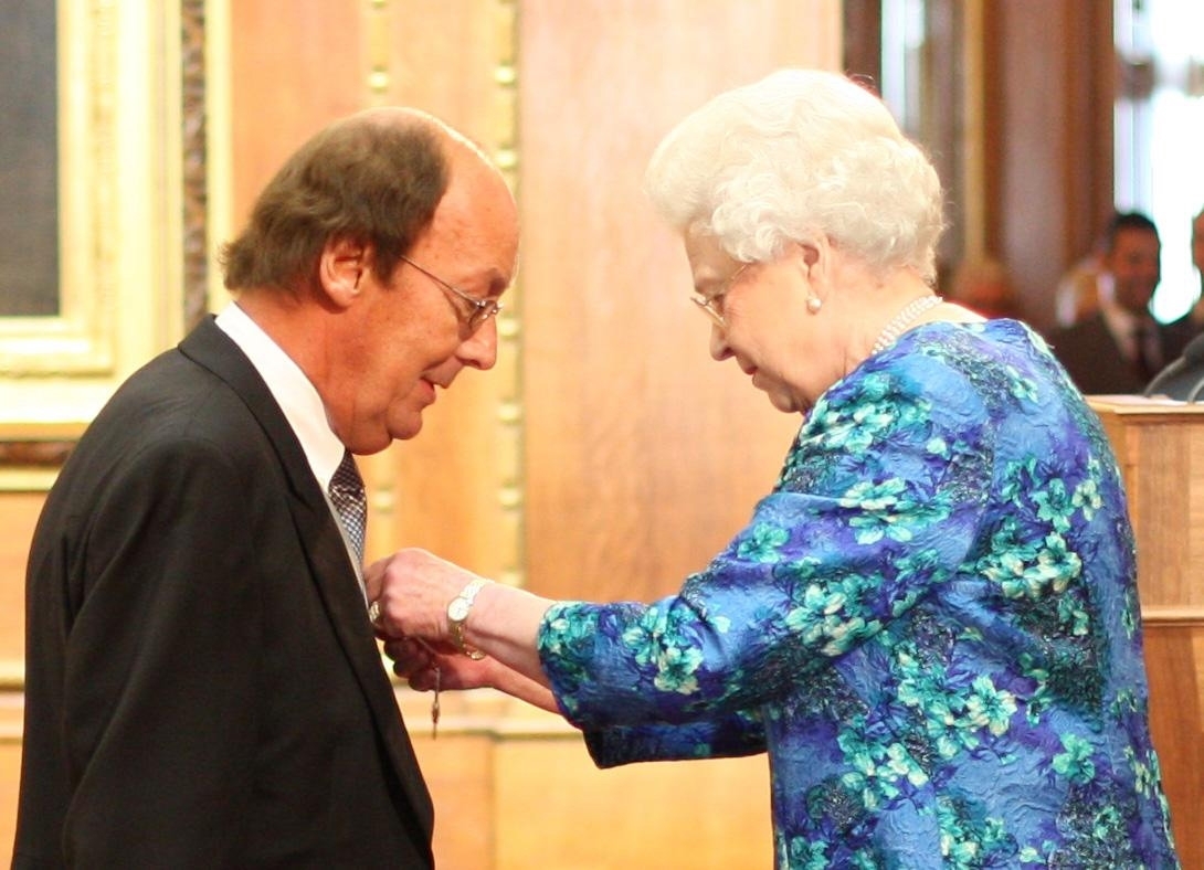 TV Presenter Fred Dinenage during an Investiture ceremony at Windsor Castle where he was made a Member of the British Empire (MBE) by Queen Elizabeth II.