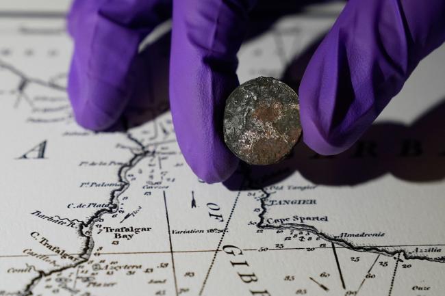 Conservation workers discovered a 127-year-old coin under the mast of the HMS Victory (Andrew Matthews/PA)