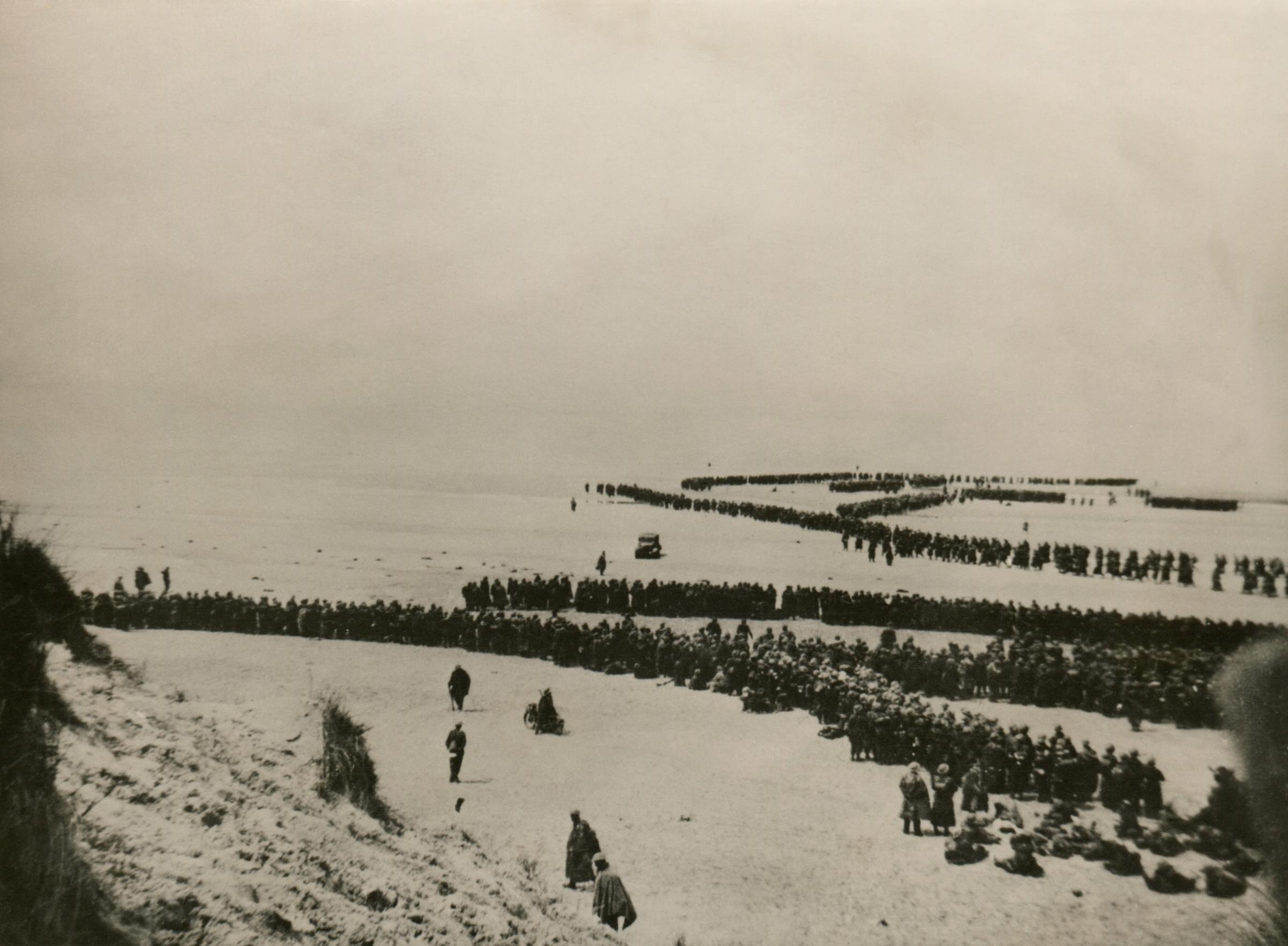 Military evacuation of Dunkirk during World War 2. Thousands of British and French troops wait on the dunes of Dunkirk beach for transport to England. May 26-June 4, 1940.; Shutterstock ID 251930563; Purchase Order: HERALD NEWS 19/5/19; Job: BATTLE OF