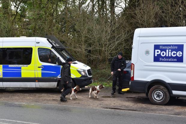 Daily Echo: Police dog units in Shore Road, Hythe. Photo: Solent News and Photo Agency.