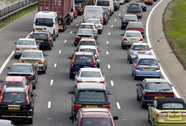 Traffic on the M27. Stock image.