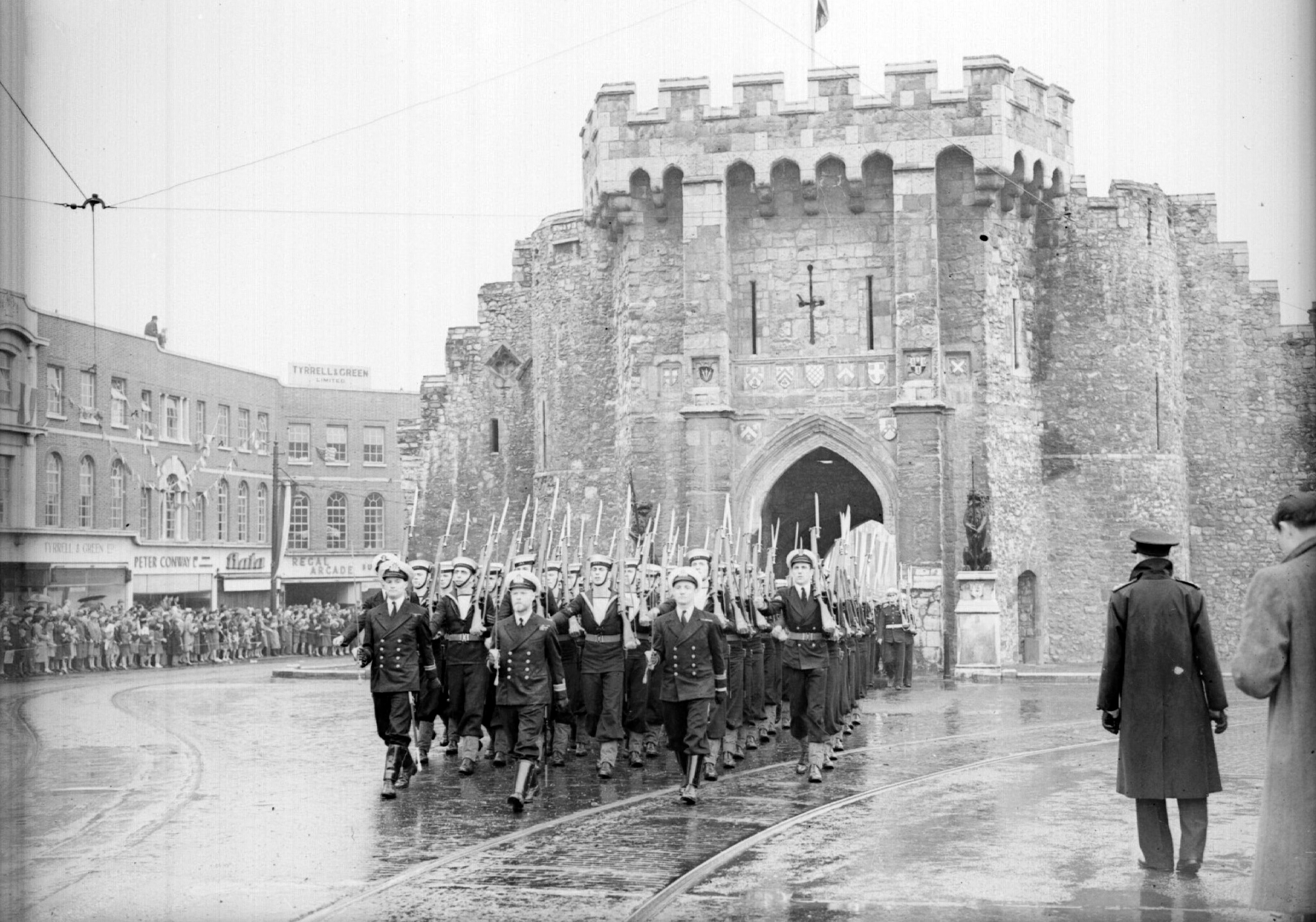 V-Day preperations in Southampton. Parade marching though the Bargate. June 8, 1946. THE SOUTHERN DAILY ECHO ARCHIVES. HAMPSHIRE HERITAGE SUPPLEMENT. Ref: 591