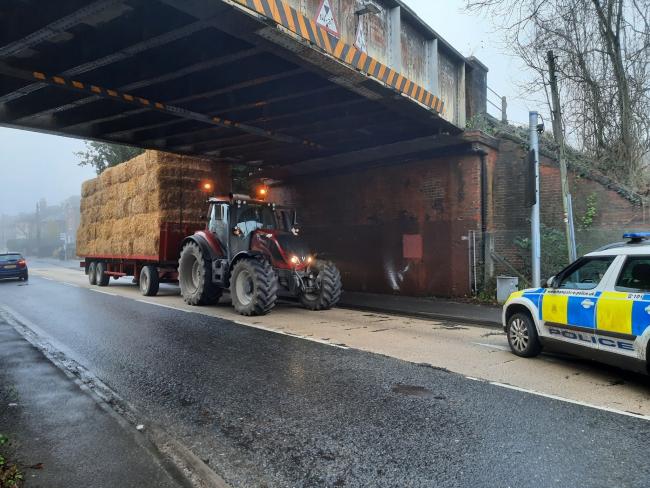 A tractor at the bridge in Winchester Road. Photo: Romsey Police