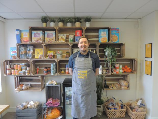 Daily Echo: Round About Cafe, Cafe Supervisor Nigel with the new community pantry in Mansbridge