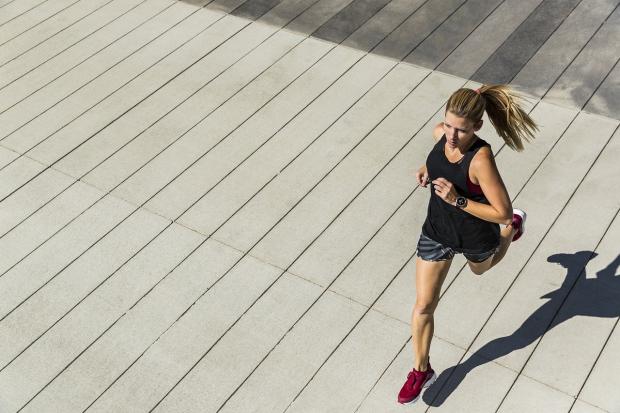Photo via Pixabay shows a woman running.
