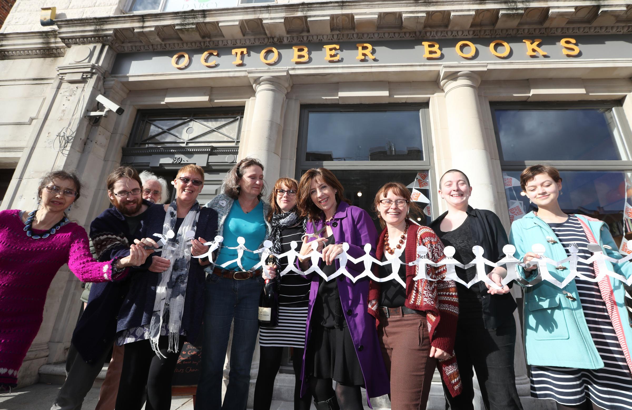 Opening of October Books follow its move to the former bank in Portswood, Author Ali Sparkes cuts the ribbon.