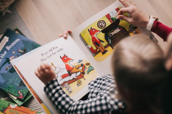 Daily Echo: A mother and child reading together. Credit: Canva Daily Echo: A mother and child reading together. Credit: Canva