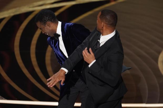 Will Smith storms Oscars stage and hits Chris Rock after joke about wife (PA)