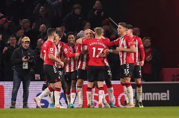 Daily Echo: Saints celebrate scoring against Norwich earlier this season. Image by: PA