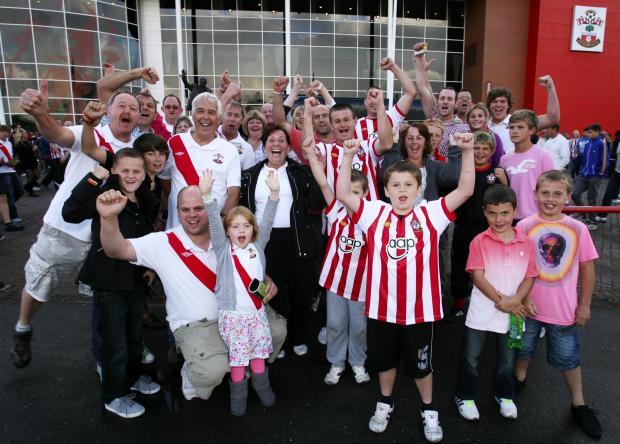 Daily Echo: Saints fans celebrate the 3-1 win against Leeds. Image by: Chris Moorhouse