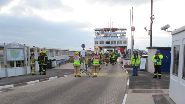 Daily Echo: Archive photo shows Hampshire firefighters on the scene after the Isle of Wight ferry fire.