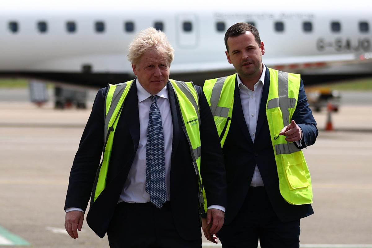 Prime Minister Boris Johnson and Eastleigh MP Paul Holmes at Southampton Airport. Photo: PA