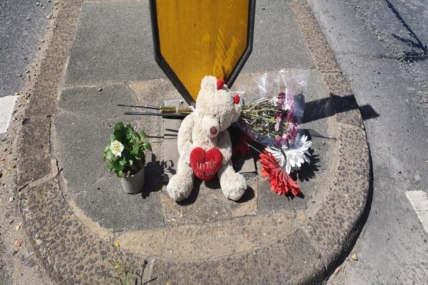 Tributes have been left at the dual carriageway in Bitterne Road West, Southampton, where a 45-year-old woman died on May 2.