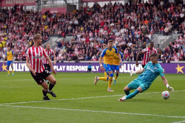 Ajer slots in Brentford's third goal. Image by: PA