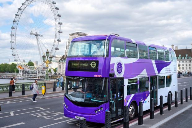 The iconic red has vanished from London buses as they get a purple makeover. (PA)