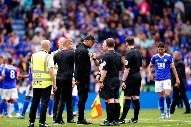 Southampton manager Ralph Hasenhuttl speaks to referee Jon Moss at the end of the Premier League match at The King Power Stadium, Leicester. Picture date: Sunday May 22, 2022.