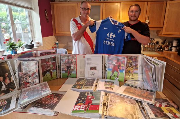 Steve and Michael Morrison with Allan Tchaptchet's signed shirt and some of their memorabilia
