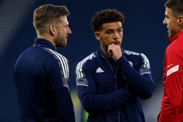 Scotland's Che Adams and Stuart Armstrong during the International Friendly match at Hampden Park, Glasgow. Picture date: Thursday March 24, 2022.