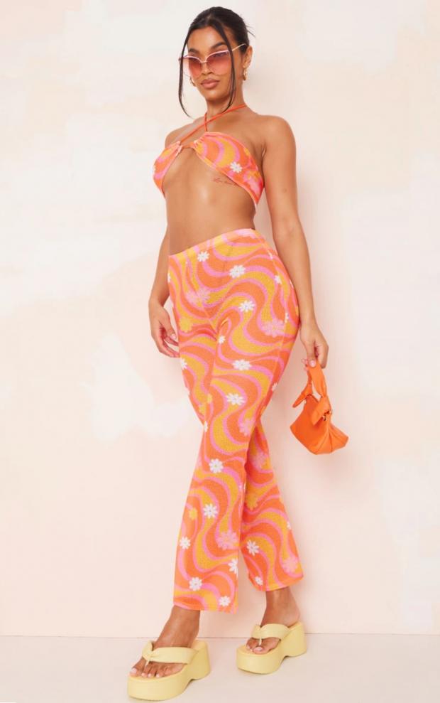 Daily Echo: Orange Flower Swirl Print Knit Flare Trousers (PrettyLittleThing)