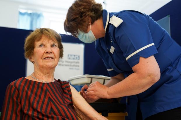 Daily Echo: Margaret Keenan, 92, receives her spring Covid-19 booster shot at University Hospital Coventry. Picture: PA