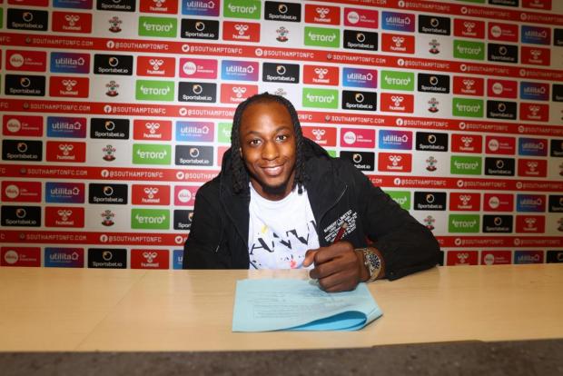 Daily Echo: Aribo posing with his Saints contract. Image by: Southampton FC