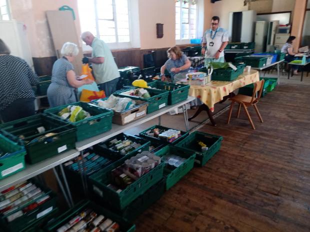 Daily Echo: Volunteers work to feed Sotonians at Southampton City Missions' Basics Bank.