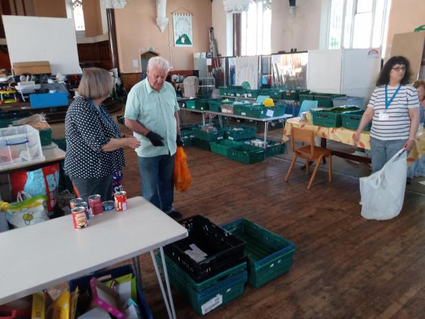 Daily Echo: Volunteers work to feed Sotonians at Southampton City Missions' Basics Bank.