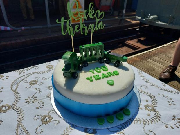 Daily Echo: A birthday cake baked to celebrate the 100th birthday of the Hythe pier train. Picture: Alan Titheridge.