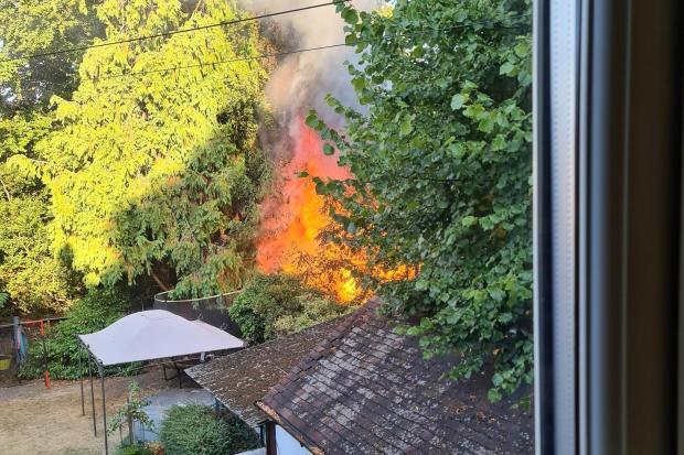 Flames were seen from a resident's window. Picture: Mark Jones