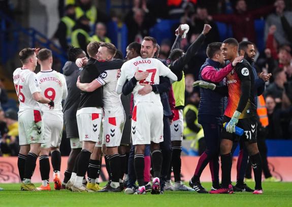 Daily Echo: Ruben Selles celebrates with his Saints players after victory at Chelsea. Daily Echo: Ruben Selles celebrates with his Saints players after victory at Chelsea.
