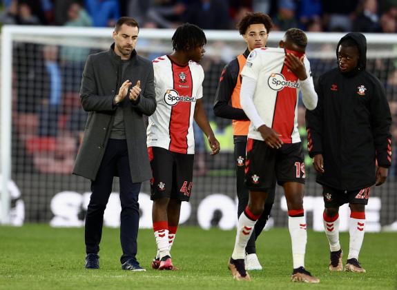 Daily Echo: Moussa Djenepo trudges off the pitch with his Saints teammates after defeat to Manchester City. Daily Echo: Moussa Djenepo trudges off the pitch with his Saints teammates after defeat to Manchester City.